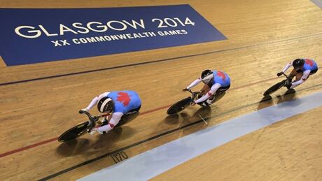 Canada's Hugo Barrette, Joseph Veloce and Vincent de Haitre compete in the men's team sprint qualifying round in the Sir Chris Hoy Velodrome during the 2014 Commonwealth Games in Glasgow, Scotland on July 24, 2014. cycling-620