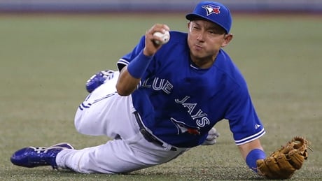 A playful wink is a common reaction to a tough play from effervescent infielder Munenori Kawasaki of the Toronto Blue Jays. kawasaki-munenori-140719