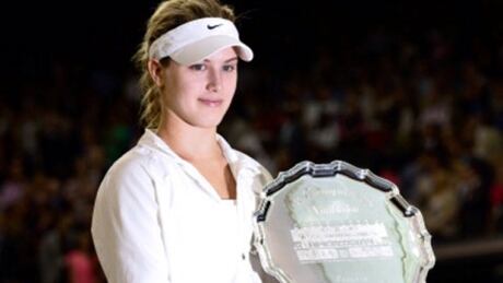 Canadian Eugenie Bouchard poses the runners-up trophy after losing to Petra Kvitova in the ladies singles Wimbledon final on July 5. eugenie-bouchard