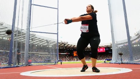 GLASGOW, SCOTLAND - JULY 27: Sultana Frizell of Canada competes in the Women's Hammer Throw qualification at Hampden Park Stadium during day four of the Glasgow 2014 Commonwealth Games on July 27, 2014 in Glasgow, Scotland. (Photo by Cameron Spencer/Getty Images) frizell-140727-620