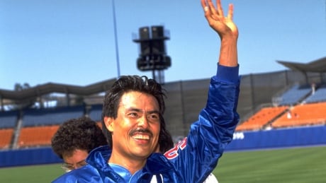 Former Expos pitcher Dennis Martinez acknowledges the crowd at Dodger Stadium in Los Angeles after throwing the 13th perfect game in major-league history on July 28, 1991, a 2-0 Montreal victory. martinez-dennis