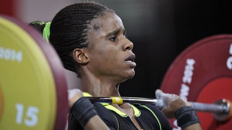 Nigeria's gold medalist Chika Amalaha competing in the women's weightlifting 53kg class, at the SECC Precinct during the 2014 Commonwealth Games in Glasgow, Scotland, July 25, 2014. AFP PHOTO/ANDY BUCHANAN (Photo credit should read Andy Buchanan/AFP/Getty Images) amalaha-140725-620