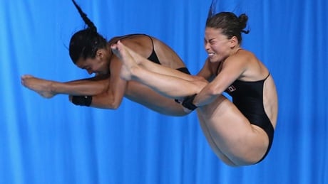 EDINBURGH, SCOTLAND - JULY 30: Meaghan Benfeito and Roseline Filion of Canada compete in the Women's Synchronised 10m Platform Final at Royal Commonwealth Pool during day seven of the Glasgow 2014 Commonwealth Games on July 30, 2014 in Edinburgh, United Kingdom. benfeito-filion-140730-620