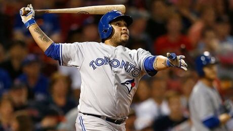 BOSTON, MA - JULY 30: Dioner Navarro #30 of the Toronto Blue Jays watches the flight of a long fly ball to right field in the ninth inning against the Boston Red Sox at Fenway Park on July 30, 2014 in Boston, Massachusetts. navarro-dioner-620
