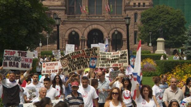 Hundreds gathered at Queen's Park in Toronto today to ask the government for aid and humanitarian intervention regarding the ongoing persecution of Christians in Iraq by militant group ISIS. 