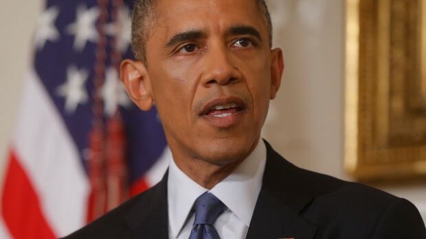 U.S. President Barack Obama authorized targeted air strikes in Iraq to prevent an 'act of genocide' against some 40,000 religious minorities trapped in a remote mountain area.