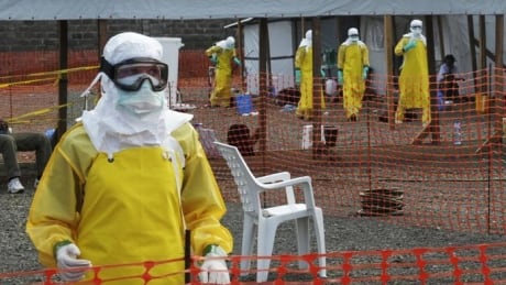 Medicins Sans Frontieres (MSF) health workers prepare at ELWA's isolation camp during the visit of Senior United Nations (U.N.) System Coordinator for Ebola David Nabarro, at the camp in Monrovia August 23, 2014.As the outbreak has spread across borders from its initial epicentre in Guinea, governments in the region have introduced increasingly strict travel restrictions. Ivory Coast has closed its land borders Guinea and Liberia to try to prevent the virus from crossing onto its territory, the government announced late on Friday. REUTERS/2Tango (LIBERIA - Tags: HEALTH SOCIETY DISASTER TPX IMAGES OF THE DAY) - RTR43H2P HEALTH-EBOLA/