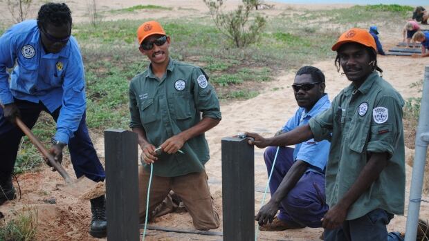Daryl Lacey, centre, is a senior indigenous park ranger with the Dhimurru Indigenous Protected Area in Australia's Northern Territory. All the rangers in the IPA are members of the Yolngu people.