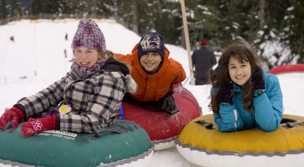 Kids tubing at Mount Seymour