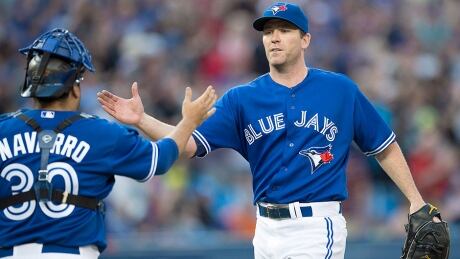 Casey Janssen, right, reportedly has signed a one-year, free-agent contract with the Washington Nationals after saving 25 games in Toronto for the Blue Jays last season. 07125071-janssen-casey