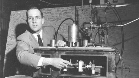 In this Jan. 25, 1955, file photo, Charles Hard Townes, Columbia University professor and Nobel laureate, explains his invention of the maser during a news conference in New York City. Charles Townes