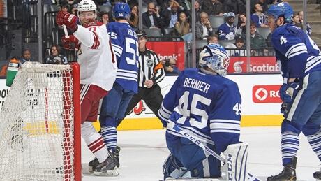 Martin Hanzal (11) of the Arizona Coyotes celebrates a goal by teammate Sam Gagner (9) against Jonathan Bernier of the Toronto Maple Leafs during the game Thursday in Toronto. Jonathan Bernier
