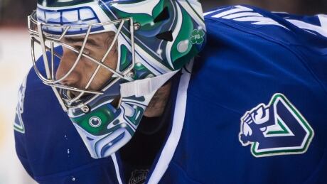 Vancouver Canucks goalie Ryan Miller waits during a break in play during the first period of the game against the Anaheim Ducks in Vancouver Friday. Ryan Miller spent his entire NHL career with the Buffalo Sabres until being traded to the St. Louis Blues last season. Ryan Miller