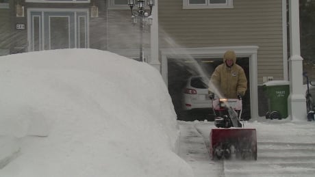 Fredericton residents were busy clearing their driveways on Saturday morning after another snowstorm. Fredericton snowblower