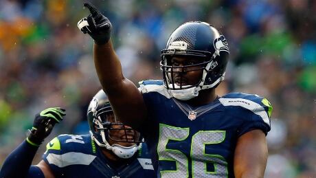 Seahawks defensive end Cliff Avril, right, says the pressure to win in hopes of getting a chance to repeat as Super Bowl champions was there early this season. "But then we just forgot about it ... and I think that's what let us take the next step to be able to get here – not thinking about it." avril-cliff