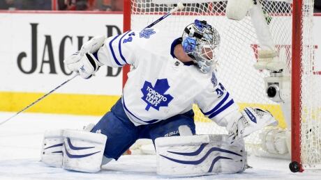 Toronto Maple Leafs goalie James Reimer (34) covers the puck against the Philadelphia Flyers during the second period at Wells Fargo Center. James Reimer
