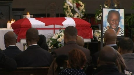 Mourners attend the funeral for Elijah Marsh, 3, at St. Matthews United Church in Toronto on Feb. 28, 2015. marsh-funeral