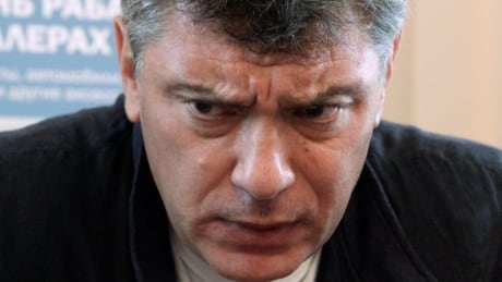 Opposition leader Boris Nemtsov speaks during a news conference to present the report "The Life of a Galley Slave" in Moscow, August 28, 2012. Vladimir Putin once compared ruling Russia to being a "galley slave", but four yachts that come with the job, not to mention palaces, aircraft and a wealth of luxury perks help explain his refusal to quit the presidency, leading critics said on Tuesday. REUTERS/Maxim Shemetov (RUSSIA - Tags: POLITICS) - RTR376RV Boris Nemtsov