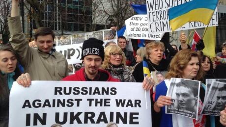 People with pro-Vladmir Putin signs crashed a rally at the Vancouver Art Gallery organized by the opposition. Pro-Putin signs at Russian opposition rally