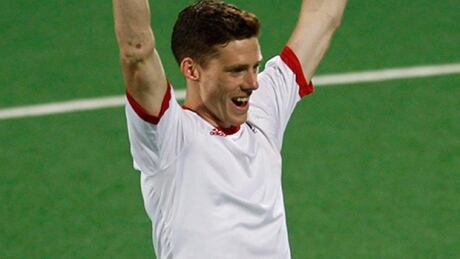 Canada's Scott Tupper scored a hat trick to lead the national team past Italy Thursday in the men's field hockey World League quarter-final in San Diego, Calif. He is seen here celebrating after scoring a goal against Poland during a match in in New Delhi, India. Scott Tupper