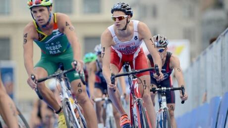 Canadian Matt Sharpe, centre, won a silver medal at the Oceania Cup triathlon in Mooloolaba, Australia on Sunday. Matt Sharpe