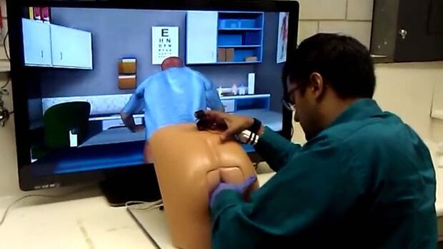 A student giving a virtual prostate exam to "Patrick."