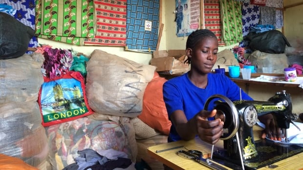 Martina Daniel, who ran away from home to avoid female genital mutilation and then convinced her parents not to go through with it, now works as a seamstress in a shop in Tarime, Tanzania that employs former child brides.