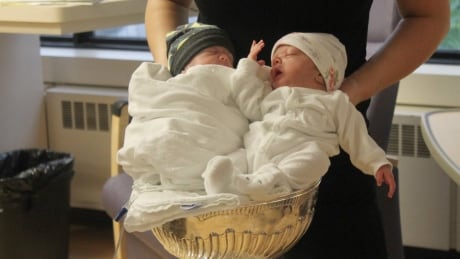 These two mighty little Sudburians had no idea they were sitting inside hockey's most famous trophy this week. Babies in the Stanley Cup