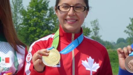 Lynda Kiejko is all smiles with what would be just her first gold medal. Lynda Kiejko 7/15/2015