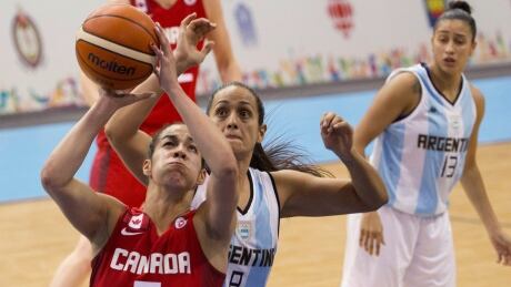 Point guard Kia Nurse, front, will be a key player if Canada hopes to unseat the Americans in the gold-medal basketball game at the Pan Am Games on Monday night. CBCPanAm-KiaNurse