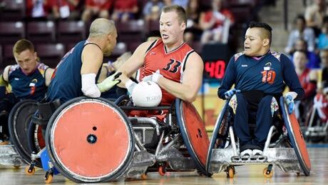 Nunez and Madell battle it out for the ball, while Colombia's Uriel Rodriguez Diaz definitely has the best view from the outside.
RGU Parapan Am Games 20150809