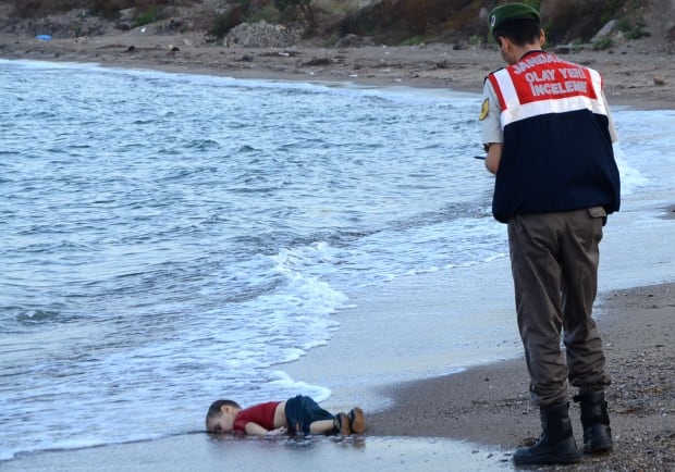 2015 photos of the year toddler Alan Kurdi body washed up Sept 2 Turkish beach
