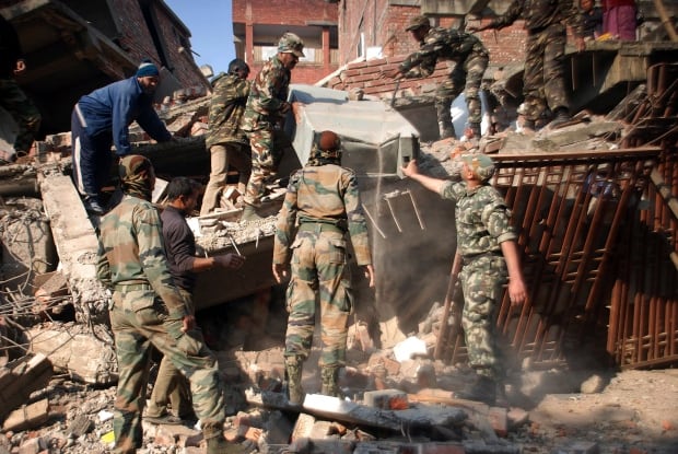India Earthquake soldiers debris Imphal