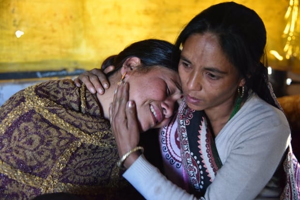 India earthquake women family Imphal