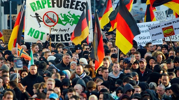 Supporters of the anti-immigrant, right-wing movement PEGIDA (Patriotic Europeans Against the Islamization of the West) demonstrate in Cologne last weekend.
