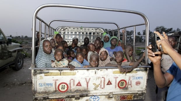 Women and children rescued from Islamist militant group Boko Haram in the Sambisa forest by the Nigerian military arrive at an internally displaced people's camp in Yola, Adamawa State, Nigeria, on May 2, 2015. There's been a ten-fold increase in child suicide bombers deployed by Boko Haram over the last year, UNICEF says.