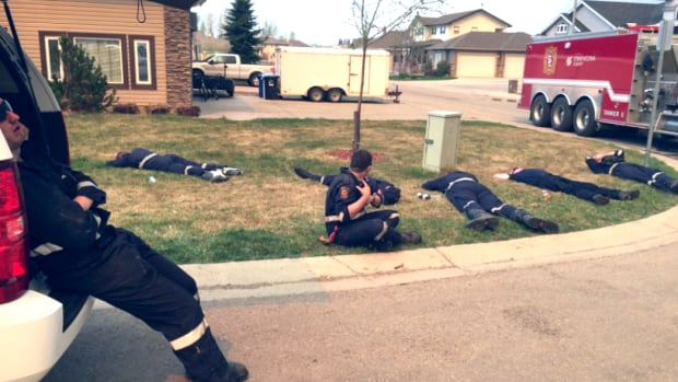 Strathcona County firefighters sent to Fort McMurray take their first break on Wednesday after hours of trying to save homes in the city.