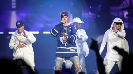 Stratford, ON native Justin Bieber wears a Maple Leafs jersey as he plays the first of his two Toronto concerts during his Purpose world tour. Justin Bieber Toronto Purpose world tour
