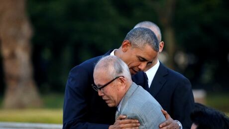 U.S. President Barack Obama (L) hugs an atomic bomb survivor Shigeaki Mori as he visits Hiroshima Peace Memorial Park in Hiroshima, Japan May 27, 2016. JAPAN-OBAMA/HIROSHIMA