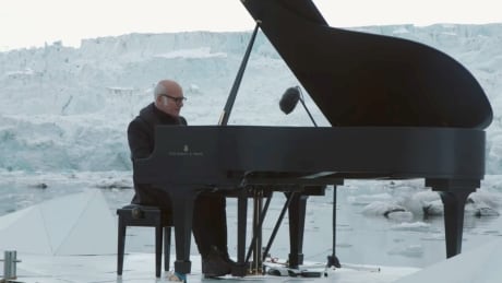 Pianist Ludovico Einaudi plays iceberg concert to draw attention to Arctic Ocean protection