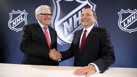 NHL Commissioner Gary Bettman, right, and Bill Foley pose for photographers during a news conference Wednesday in Las Vegas. Bettman announced an expansion franchise to Las Vegas after the league's board of governors met in Las Vegas. Foley is the majority owner of the team. NHL Vegas Hockey