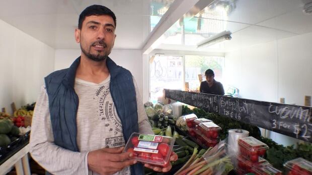 Wali Barak runs the new Moss Park Market, a fresh produce market for low income people in a shipping container near Queen Street East and Sherbourne Street. 