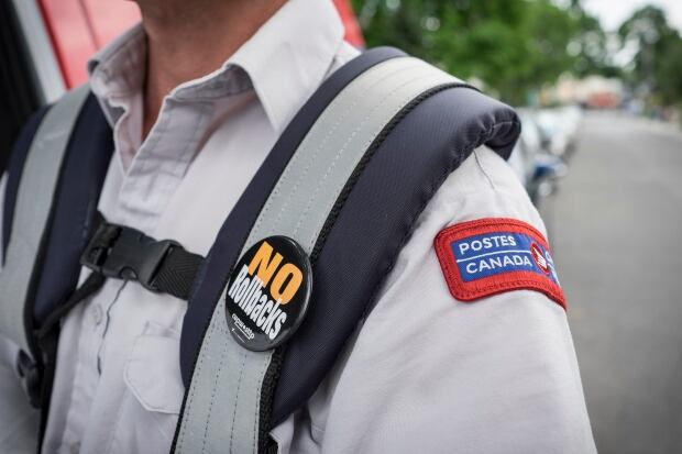 Canada Post union pin reads no rollbacks July 5 2016