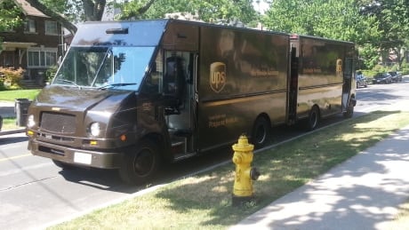 UPS trucks go back to back to sort parcels in a Toronto neighbourhood this week. Private parcel services are already overloaded as Canadians look for alternatives to Canada Post. UPS trucks just before Canada Post dispute