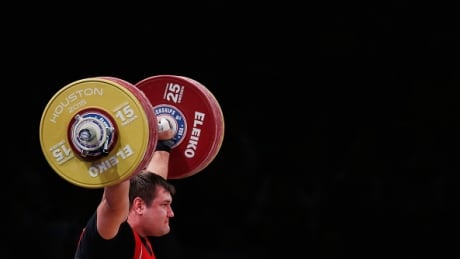 Russia's entire weighlifting team was banned from competing at the Rio Olympics in a decision released on Friday. russia-weightlifting