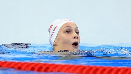 RIO DE JANEIRO, BRAZIL - AUGUST 11: Penny Oleksiak of Canada wins Gold in the Women's 100m Freestyle Final on Day 6 of the Rio 2016 Olympic Games at the Olympic Aquatics Stadium on August 11, 2016 in Rio de Janerio, Brazil. (Vaughn Ridley/Getty) Penny Oleksiak 100m freestyle gold medal swim win