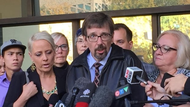 Bret McCann speaks to media outside court on Thursday after the guilty verdict was delivered in Edmonton.