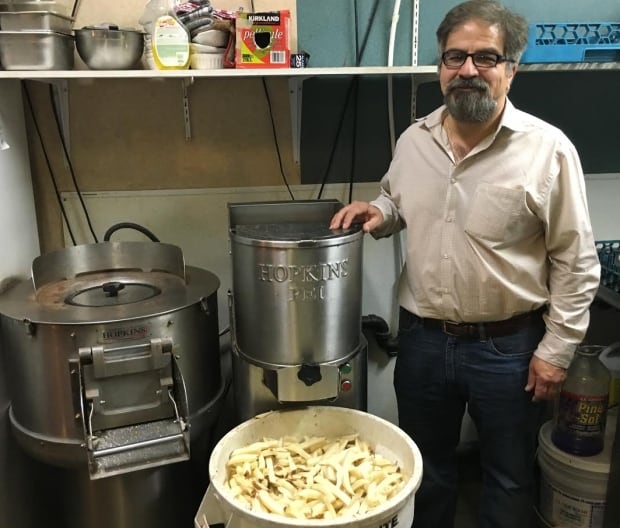 Hamid Sanayie and his french fry cutting machine