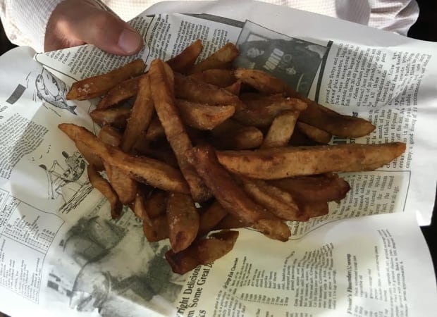 Hamid Sanayie holds french fries