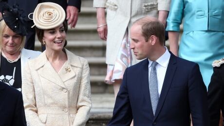 Britain's Prince William and Kate, the Duchess of Cambridge, attend the secretary of state for Northern Ireland Theresa Villiers' garden party at the royal residence at Hillsborough Castle, Northern Ireland in June. Britain Royals